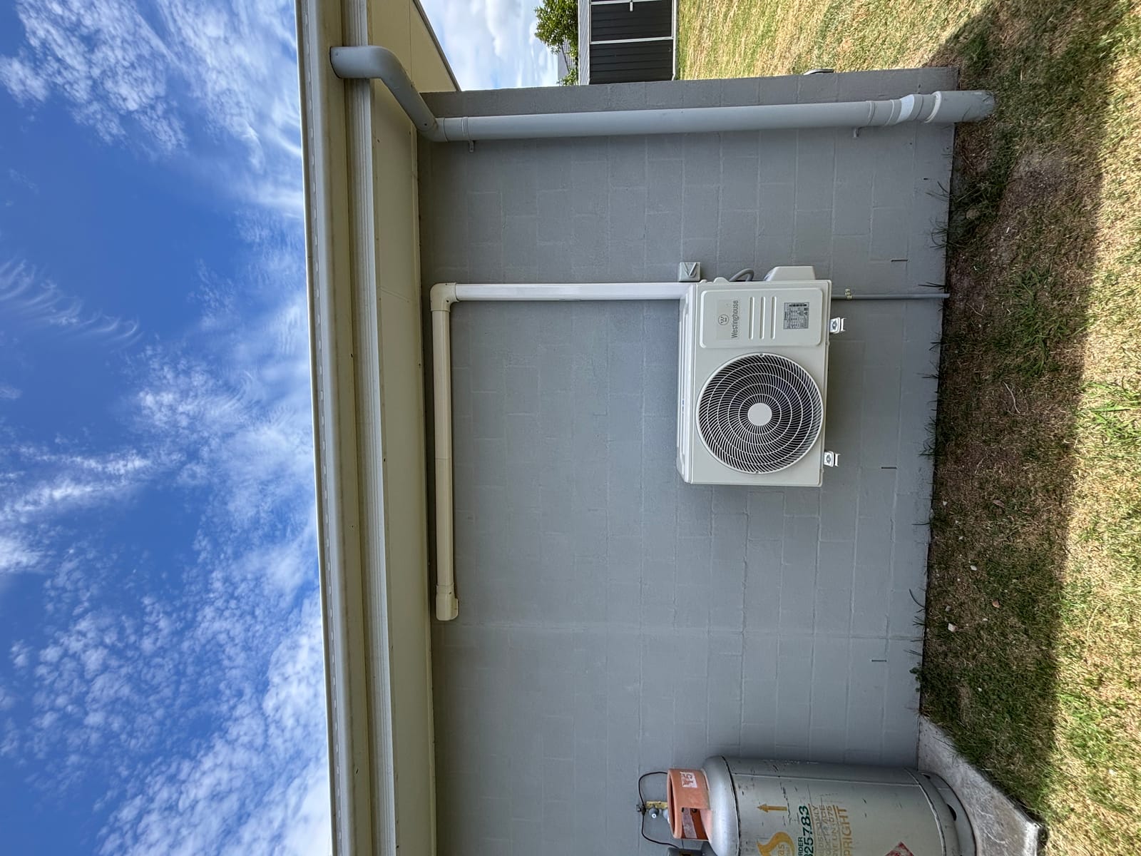 Air conditioning unit installed outdoors